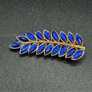 Vintage Signed Sapphire Blue Rhinestone and Gold Tone Leaf Dress Clip